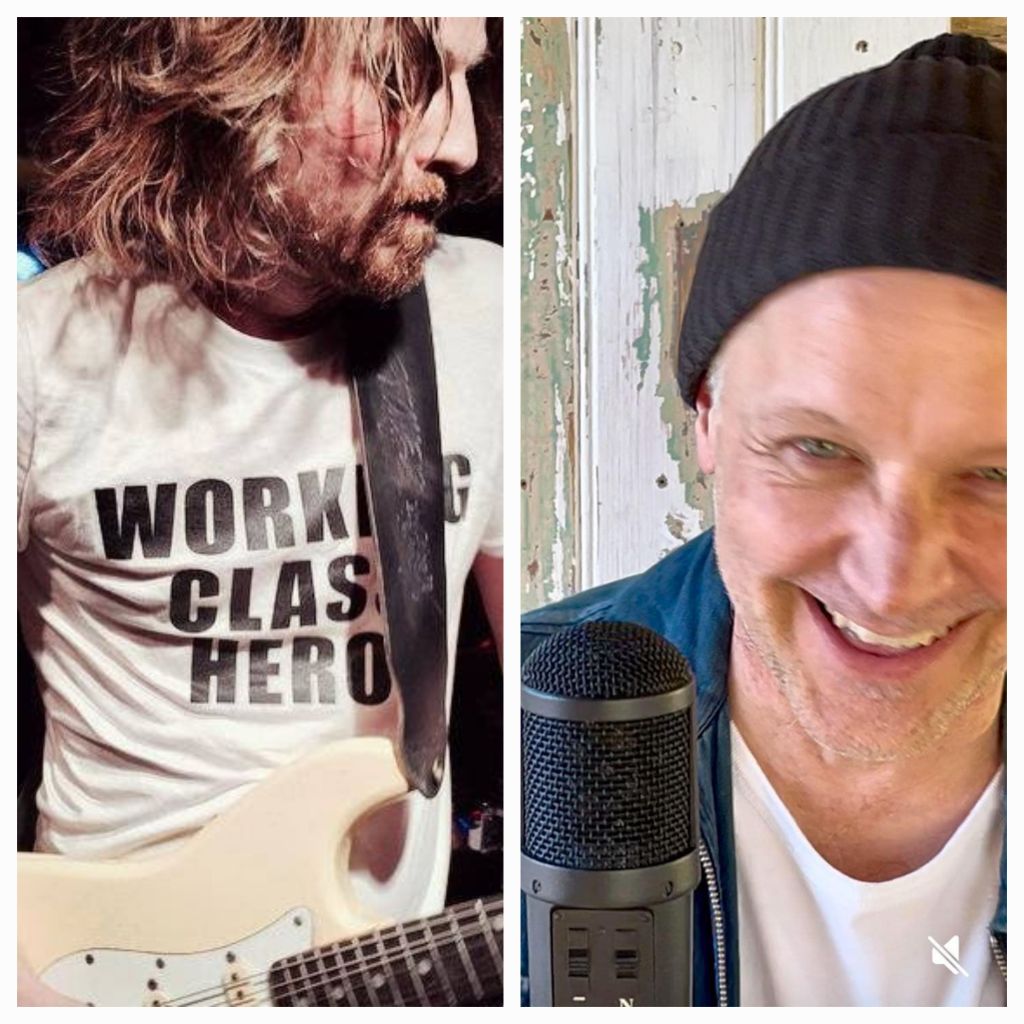 Hombre tocando la guitarra con cabello desordenado, vistiendo una camiseta con la frase 'WORKING CLASS HERO'.